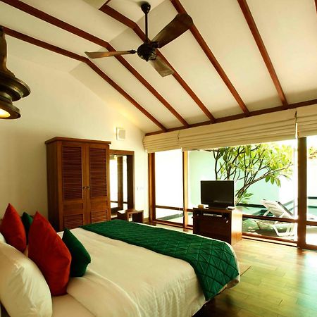 Heritage Madurai Cameră foto A bedroom at the resort
