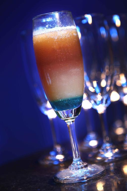 Heritage Madurai Exterior foto A layered cocktail